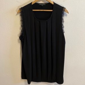 Black Banana Republic sleeveless blouse with lace.